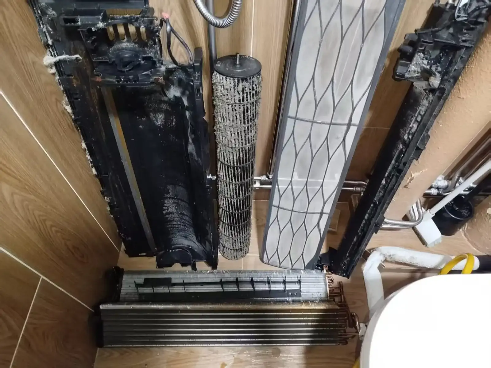 Ceiling cassette unit opened for drain outlet inspection